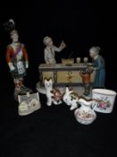 A capodimonte figure group "The Chemist",