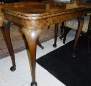 A late 19th Century mahogany and rosewood banded fold-over card table,