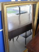 A rectangular gilt framed bevel edged wall mirror