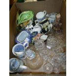 A box of various china and glass wares to include decanter and drinking glasses, jars and covers,