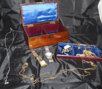 A 19th Century mahogany jewellery box containing various 9 carat gold necklaces and various costume