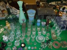 A large quantity of various glassware including drinking glasses, vases,