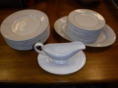 A box of creamware dinner wares including Oka sauce boat and stand and various armorial decorated