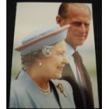 A collection of three Christmas cards from Queen Elizabeth and Prince Philip dated 1991,