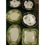 A Royal Doulton part green and gilt decorated dessert service comprising bowl,