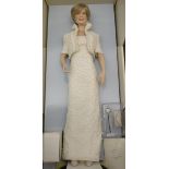 A Franklin Mint doll as Diana Princess of Wales wearing the "Elvis" dress designed by Catherine