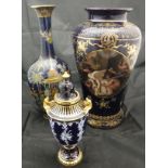 A Royal Crown Derby blue and white and gilt decorated urn shaped vase and cover,