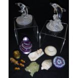 A Royal Crystal Rock glass figure of two leaping dolphins, another similar, two paperweights,