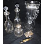 A Victorian glass lemonade jug, two Victorian facet cut decanters and stoppers,