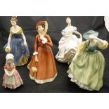 A collection of five Royal Doulton figurines including "Melanie" (HN2271), "Julia" (HN2705),
