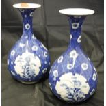A pair of Chinese blue and white baluster shaped vases in cracked ice design with floral medallions