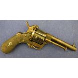 A 19th Century pin fire six shot revolver with side mounted cleaning rod and hinged loading gate,