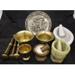 A collection of two 20th Century brass pestle and mortar and a single pestle,