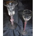 A 19th Century Dutch Masonic cut glass wine glass of inverted bell form raised on a cranberry and