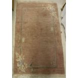 A Tibet rug of plain lilac ground with simple floral decorated corners,