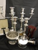 A box of assorted plated wares to include a pair of three light, two branch candelabra,
