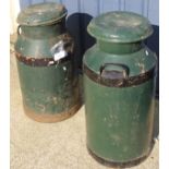 Two green painted milk churns,