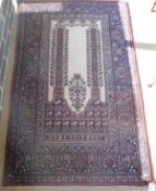 A Persian rug, the central panel set with Mirab style design with floral decorated columns,