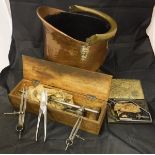 A box containing assorted tools and tooling to include a micrometer stamped "A Boucher" and no'd