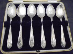 A set of six George VI silver teaspoons with Art Deco style decoration to the ends (Sheffield 1939)