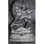 A painted cast metal doorstop of a lion rampant,