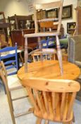 A 20th Century circular pine breakfast table on a turned pedestal,