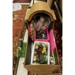 A 19th Century pine cot together with assorted toys to include a vintage painted child's push-along