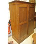 An early 20th Century mahogany two door wardrobe,