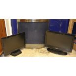 A Toshiba flat screen television, together with a Suamsung television,