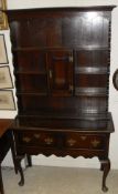 An 18th Century style oak dresser of small proportions,