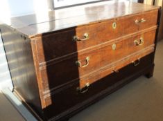 An 18th Century and later oak chest,