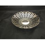 A George V silver bowl with pierced oval decoration (A & J Zimmerman,