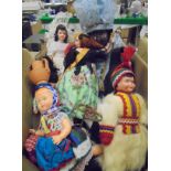 Two boxes of assorted costume dolls together with a box of assorted wall mounted hooks