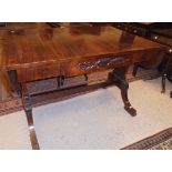 A mahogany sofa table in the Regency taste
