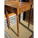 A pair of walnut side tables in the Regency manner,