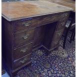 A 19th Century mahogany knee hole desk,