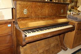 A burr walnut and inlaid cased upright piano by John Brinsmead & Sons London with iron frame