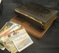 A Victorian musical photo album containing various photographs,