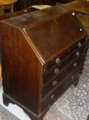 An early 19th Century mahogany and satinwood bureau,