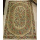 A Kashic rug, the central panel set with all-over floral sprays on a cream ground,