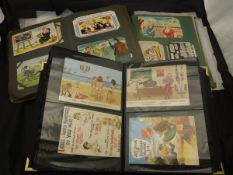 Three photo albums containing various vintage humorous seaside postcards and reproduction 1920's