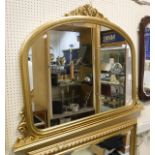A modern gilt framed over mantle mirror in the Victorian manner