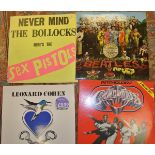 A large collection of assorted LP's to include two "Sergeant Pepper's Lonely Hearts Club Band" by