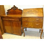A Victorian mahogany chiffonier with raised back over a single drawer and cupboard door on a plinth