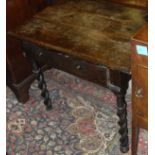 A 17th Century oak single drawer side table on barley twist supports (with alterations)