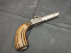 A 19th century percussion pistol in the Renaissance style