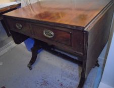 A 19th Century mahogany two drawer sofa table on end pillar supports united by a centre stretcher,