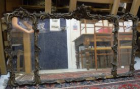 A 19th Century gilt frame mirror with triple plate and scolling decoration