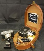 A box of various cameras and camera equipment to include a Bolex Paillard B8L 8mm cine camera