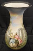 A French Pottery baluster shaped vase with painted decoration of a courting couple